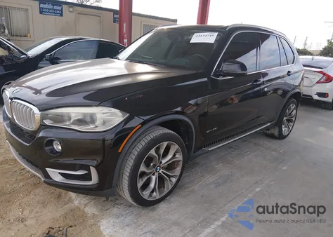 2014 BMW X5 Sdrive35I z USA, uszkodzony, nr VIN 5UXKR2C50E0C00208